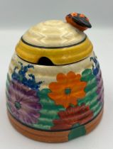 A Clarice Cliff for Wilkinson Pottery Bizarre honey pot in Gayday pattern. 9cm h.