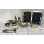 Collection of silver items to include two photo frames both 16cm x 12cm, a pair of salts with