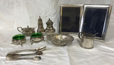 Collection of silver items to include two photo frames both 16cm x 12cm, a pair of salts with