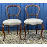Pair of Victorian mahogany balloon back dining chairs 84cm h approx 46cm to seat.
