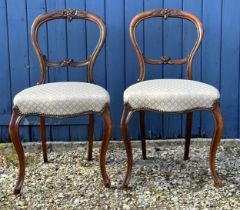 Pair of Victorian mahogany balloon back dining chairs 84cm h approx 46cm to seat.