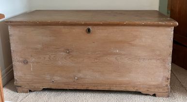 A 19thC pine blanket box with metal carrying handles and interior candle box.109cm w x 47cm d x 52cm