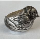 A Sampson Mordan silver pin cushion in the form of a hatching chick. Hallmarked Chester 1908.