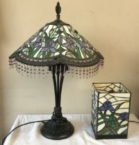 Two modern Tiffany style table lamps with leaded glass shades largest with tassels to bottom of