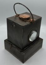 A British Railway Midlands lamp with bullseye and oil burner. Approximately 20 cm h.