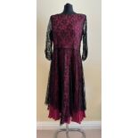 A pink evening dress with black lace overlay, underarm to underarm approx. 46cm, shoulder to hem