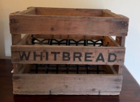 A vintage wooden Whitbread beer crate. 39cm x 28cm.