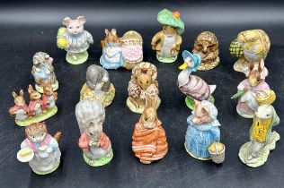 A collection of Beswick Beatrix Potter figurines to include 'Little Pig Robinson', 'Hunca Munca', '