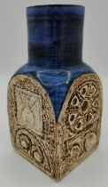 A Troika spice jar by Penny Black, signed PB, features geometric patterns on all sides on a white