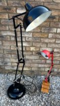 Two vintage Anglepoise lamps. Black with weighted base, approx 112cm and red on a wooden three