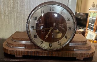 Art Deco mantle clock with chrome mounts. 45cm w x 24cm h.