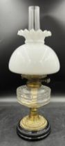 A 19thC Hinks’s patent Duplex glass, brass and ceramic oil lamp complete with shade and chimney 55cm