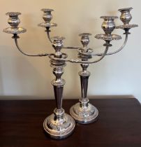 A pair of Sheffield Plate candelabra with removable branches to form either two three branch or