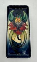 A Moorcroft trinket dish/tray. Possibly Anna Lilly pattern. Impressed mark to base and marked CH /