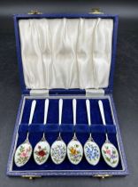 A collection of six S J. Rose & Son silver spoons Birmingham 1971 with lined fitted case, each spoon