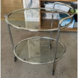 Art Deco Savoy chrome cocktail trolley. Two tiers on casters with oval etched glass. 67cm w x 47cm d