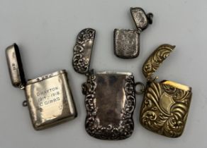 Four vesta cases, two hallmarked silver, Birmingham 1919, Birmingham 1886, a sterling silver case