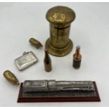 Brass and other metal items to include pig vesta case, bottle lighter, letter box money box 11cm