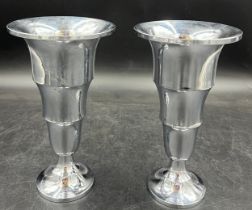 A pair of Art Deco chrome stepped vases, made by Beldray. 22cm h.