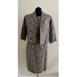A 1960's Mandell Couture London dress and matching jacket in olive green and silver lurex,