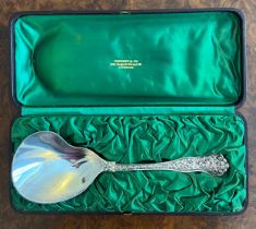 A Tiffany Olympian pattern sterling silver spoon in the original silk lined box. Import mark