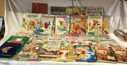 A large collection of contemporary Rupert Bear story books, annuals and two 1942 facsimile