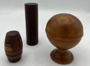 Treen to include nutmeg grater, counter container and contents 10.5cm h and a circular pedestal