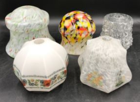 A collection of 5 glass ceiling roses, two decorated with colourful patterns, one with oriental