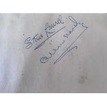 An autograph book containing signatures from Laurel & Hardy and various football teams