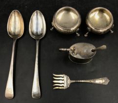 A quantity of silver items to include two 19thC serving spoons, a pickle fork marked sterling, two