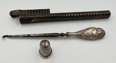 Silver to include toothbrush holder Birmingham 1888, maker George Unite and sons, a silver handled