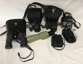 A collection of cameras to include a Lumix FZ38, a Fujifilm Finepix S8000fd and a Fujifilm Finepix
