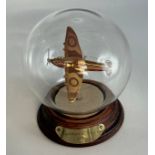 A Mayflower hand blown glass globe sculpture of a Supermarine Spitfire 1939. Ht 13cm.