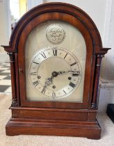 An Edwardian mahogany dome topped chiming mantle clock. 42.5cm h.