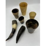 Various horn beakers including glass bottomed silver topped Grove Park Rowing Club Regatta Scratch