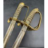 Two Victorian Naval Dress Swords, one with ornamental blade with a six pointed star on it, inscribed