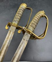 Two Victorian Naval Dress Swords, one with ornamental blade with a six pointed star on it, inscribed