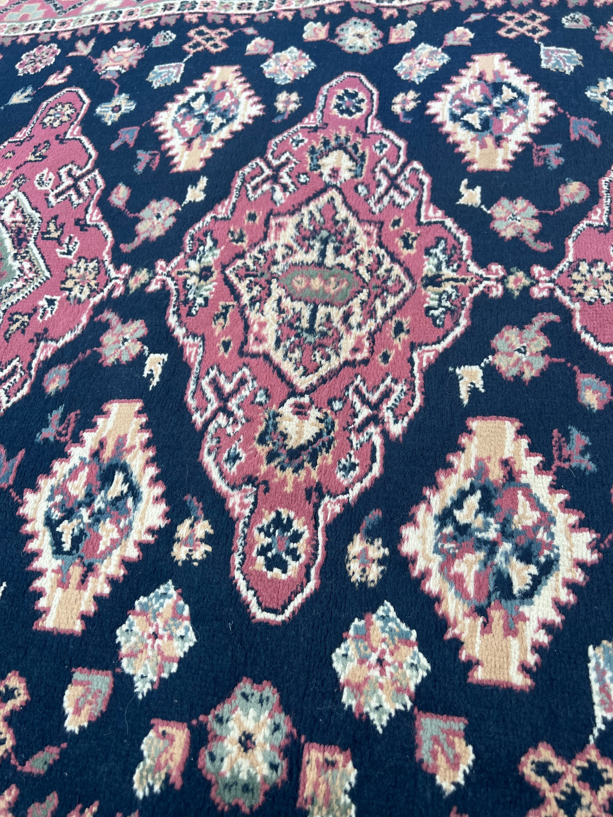 A vintage hand knotted blue/pink ground wool rug. 120 x 160cm. Possibly a Pakistan White Talim rug. - Image 3 of 4