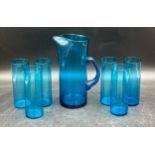 Early-Mid 20thC fine blue glass water set comprising jug 23.5cm h and six tall beakers 16cm.