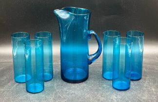 Early-Mid 20thC fine blue glass water set comprising jug 23.5cm h and six tall beakers 16cm.