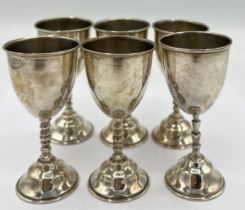 Six sterling silver miniature goblets 8cm h. (5+1). Total weight 104gm. All marked sterling .925.