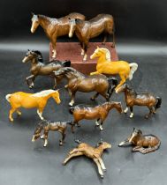 A selection of eleven Beswick horses tallest approx 19.5cm h includes two palominos and three foals.