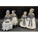 A Royal Copenhagen Porcelain Figure of Amager Girls Reading, 1395 to base, and a pair of girls,
