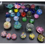 Twenty two assorted Caithness paper weights varying sizes and colours along with ten unnamed paper