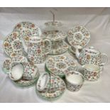 A Minton 'Haddon Hall' tea service comprising: tea pot, 6 x tea cups, 6 x saucers, coffee pot, sugar