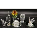 A collection of Swarovski crystal glass ornaments comprising of an owl, butterfly and swan all on