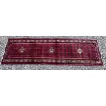 A good quality red Persian Hussainabad wool runner. 287 x 80cm.