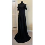 A 1950's black, crepe off the shoulder evening dress with straps, press studs to side opening and