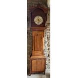 An oak longcase clock with brass face, maker John Gilbertson Ripon 222 x 52cm.