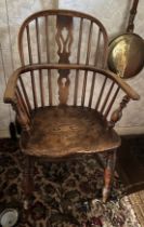 A 19thC ash and elm Windsor armchair. 92cm h to back.